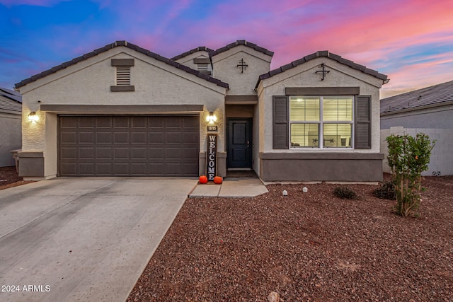 view of front of home featuring a garage