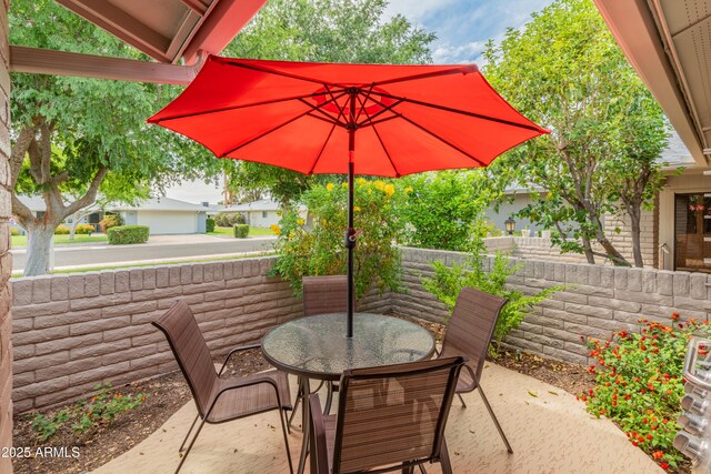 view of patio with outdoor dining area