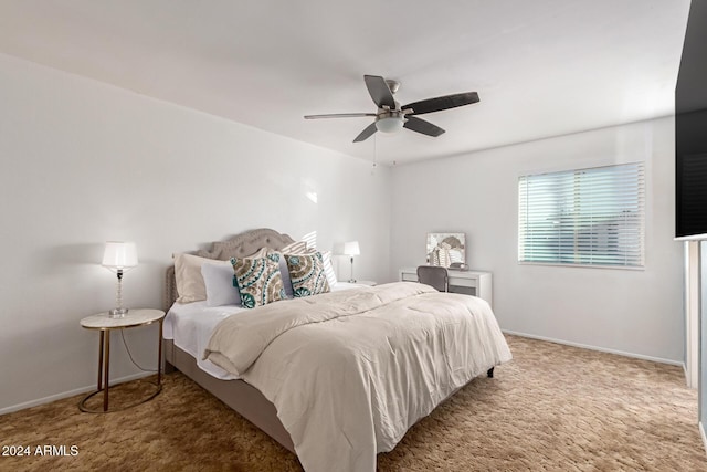 bedroom featuring carpet floors, ceiling fan, and baseboards