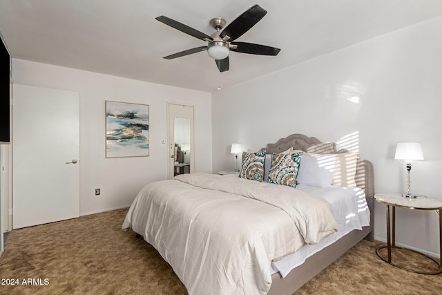 bedroom with light carpet and ceiling fan