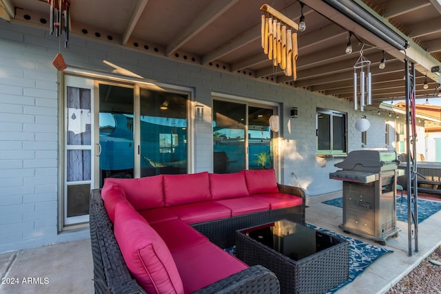 view of patio / terrace with outdoor lounge area and a grill