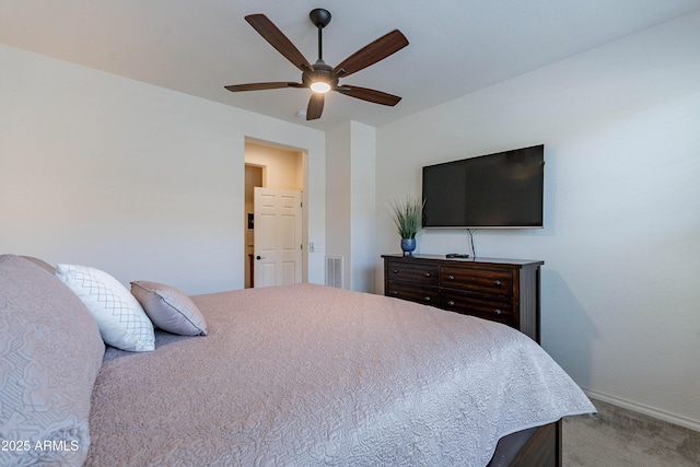 bedroom featuring carpet floors, baseboards, ceiling fan, and visible vents