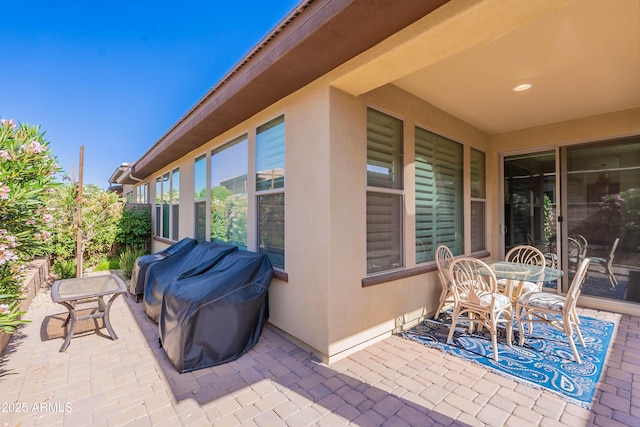 view of patio featuring outdoor dining space and area for grilling