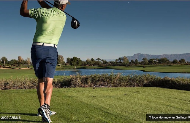 property view of water featuring a mountain view and golf course view