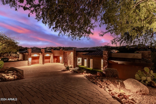 view of front of home featuring a garage