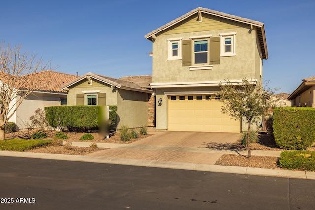 view of front of home with a garage