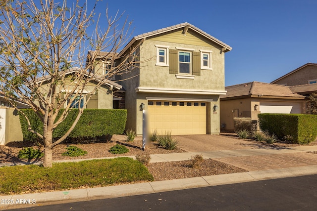 view of front of home with a garage