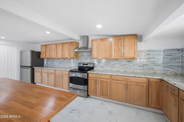 kitchen with decorative backsplash, appliances with stainless steel finishes, light stone counters, wall chimney range hood, and beamed ceiling