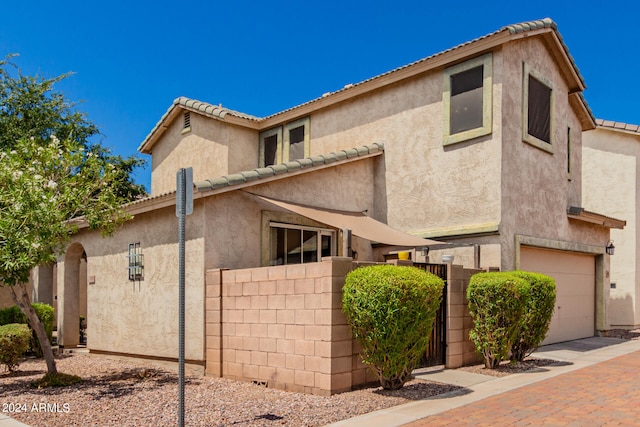 view of front of house with a garage