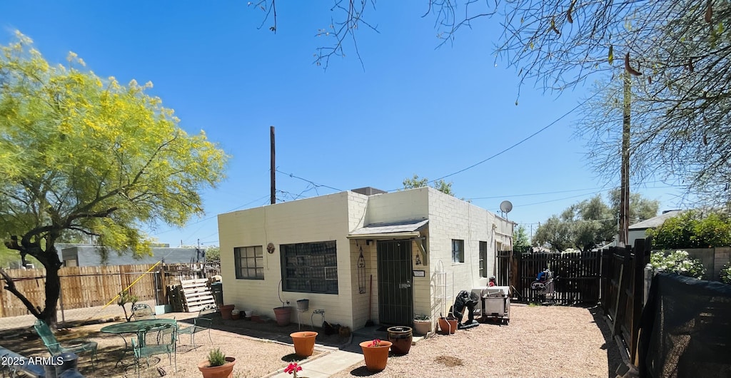 view of home's exterior with a fenced backyard