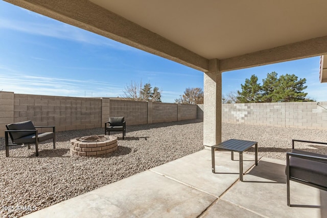 view of patio / terrace featuring a fire pit