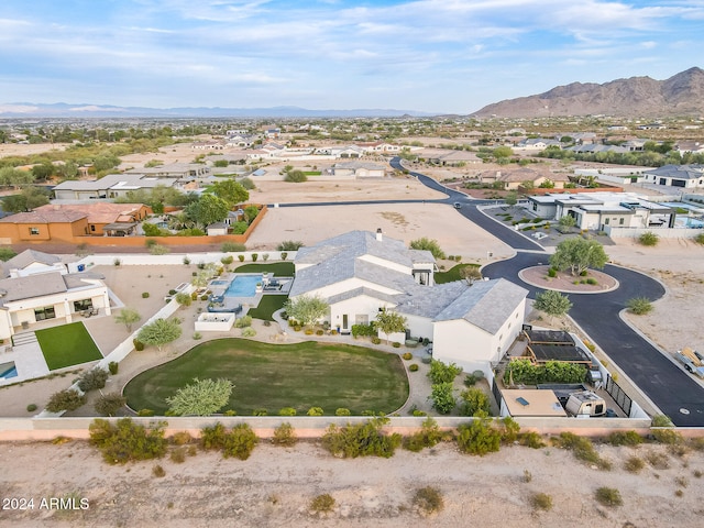 birds eye view of property featuring a mountain view