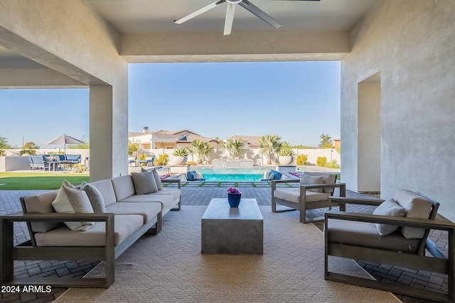 view of patio / terrace with ceiling fan and outdoor lounge area