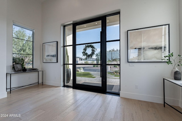 doorway to outside featuring light hardwood / wood-style flooring