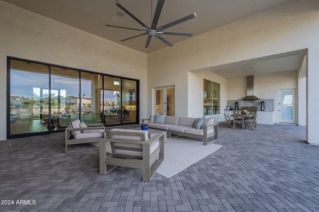 view of patio featuring an outdoor hangout area and ceiling fan