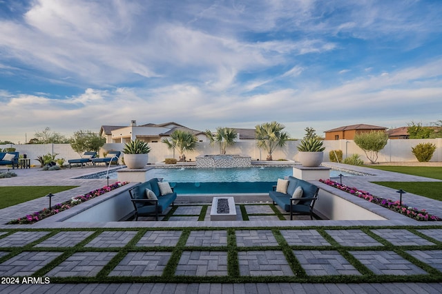 view of pool featuring a patio and pool water feature