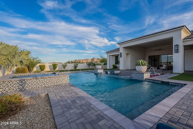 view of pool featuring a patio area and pool water feature