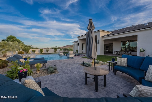 view of swimming pool featuring a patio area and outdoor lounge area