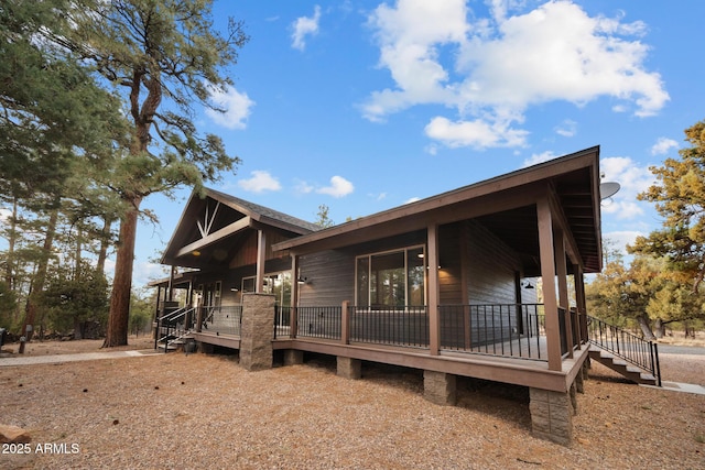 2702 Majestic Elk Rd, Overgaard, AZ 85933 - view of front of property featuring a wooden deck