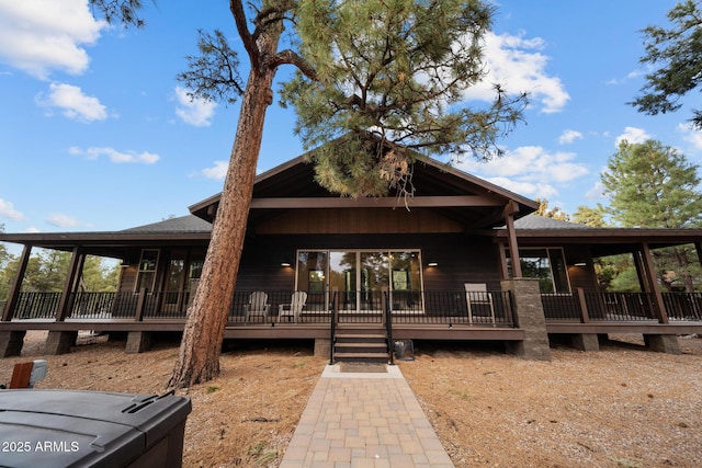 2702 Majestic Elk Rd, Overgaard, AZ 85933 - rear view of house featuring a sunroom