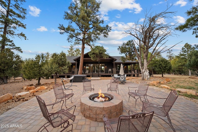 2702 Majestic Elk Rd, Overgaard, AZ 85933 - view of patio with a fire pit