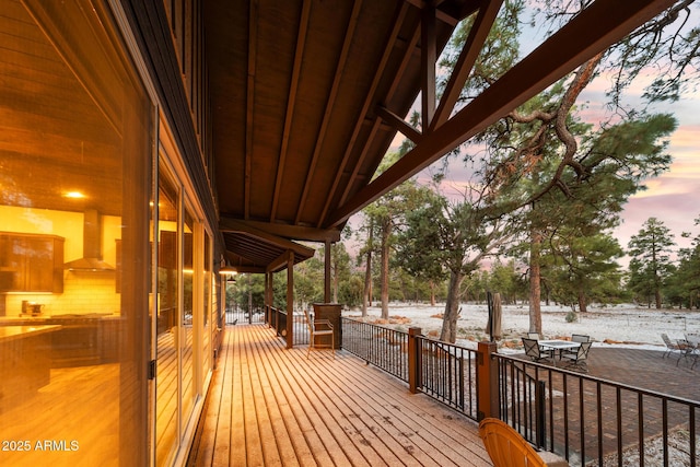 2702 Majestic Elk Rd, Overgaard, AZ 85933 - deck at dusk featuring a water view