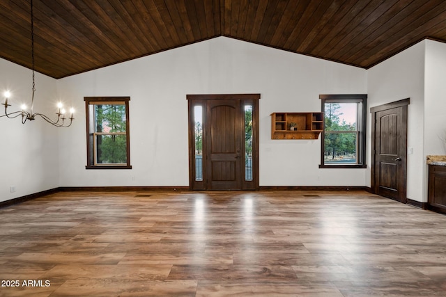 2702 Majestic Elk Rd, Overgaard, AZ 85933 - foyer featuring high vaulted ceiling, wooden ceiling, an inviting chandelier, and wood finished floors