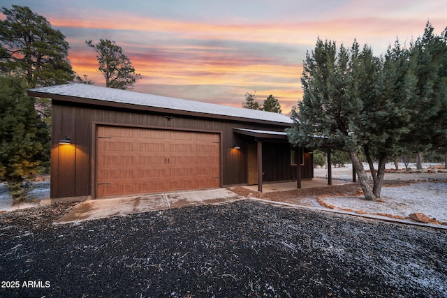 2702 Majestic Elk Rd, Overgaard, AZ 85933 - view of front of house with an attached garage and an outbuilding