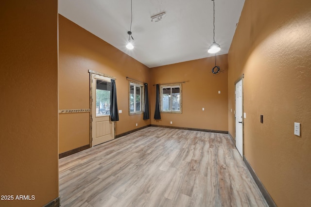 2702 Majestic Elk Rd, Overgaard, AZ 85933 - empty room with light wood-type flooring and baseboards