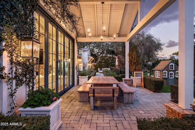 view of patio / terrace featuring french doors and outdoor dining space