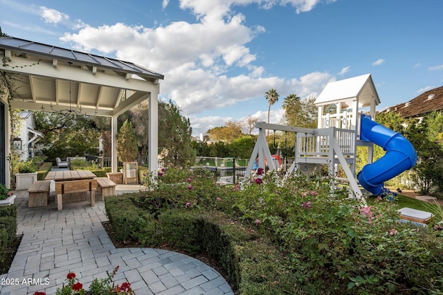 exterior space with a patio area and fence