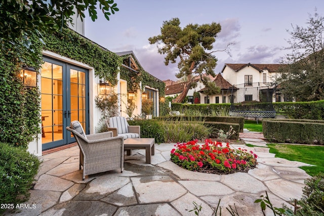 view of patio / terrace featuring french doors