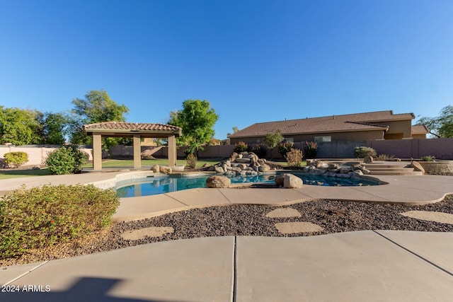 view of swimming pool with a patio area and a pergola