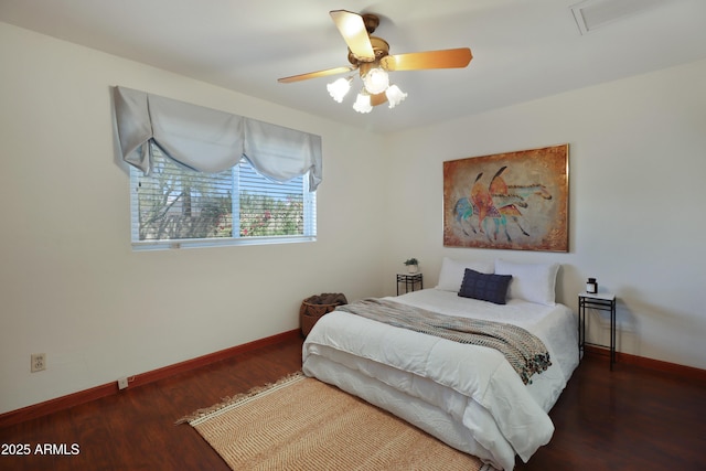 bedroom featuring dark wood-type flooring and ceiling fan