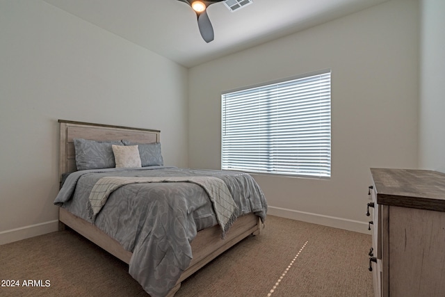 bedroom with light colored carpet and ceiling fan