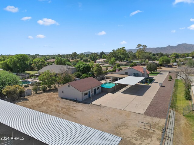 drone / aerial view featuring a mountain view