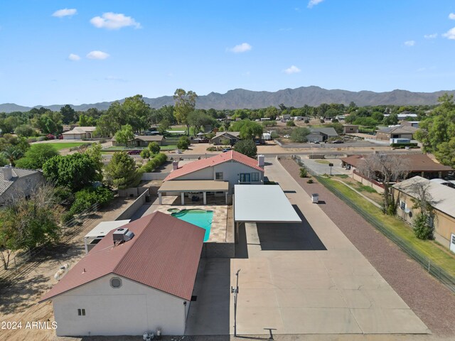 drone / aerial view featuring a mountain view