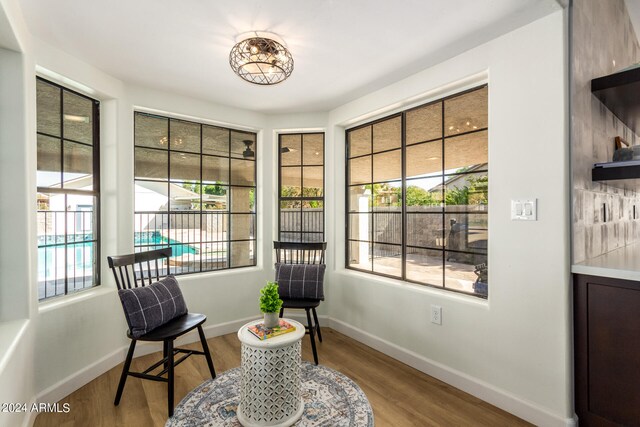 living area featuring hardwood / wood-style floors