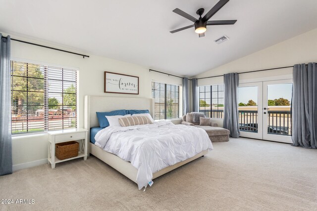 bedroom with ceiling fan, access to exterior, light carpet, lofted ceiling, and french doors