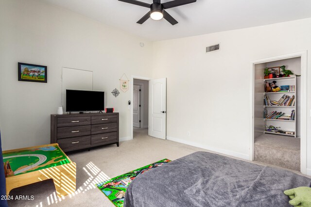 carpeted bedroom featuring ceiling fan