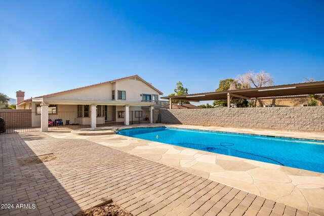 view of swimming pool featuring a patio