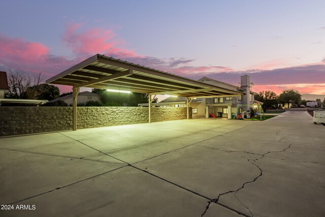 exterior space with a carport