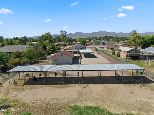 drone / aerial view featuring a mountain view