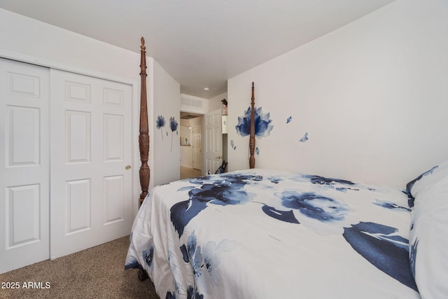 carpeted bedroom featuring a closet