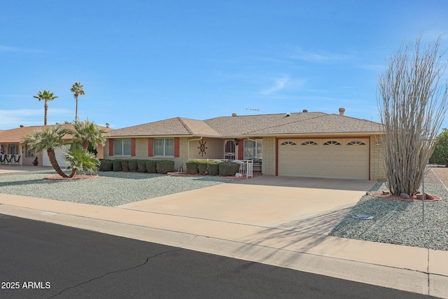 ranch-style house featuring a garage