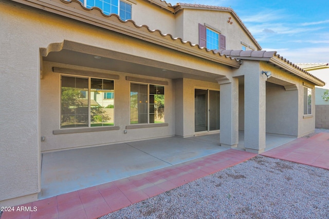 back of house with a patio area