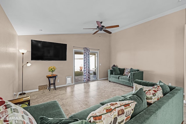 living room featuring tile patterned flooring, vaulted ceiling, and ceiling fan