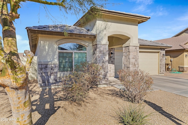 view of front of property featuring a garage