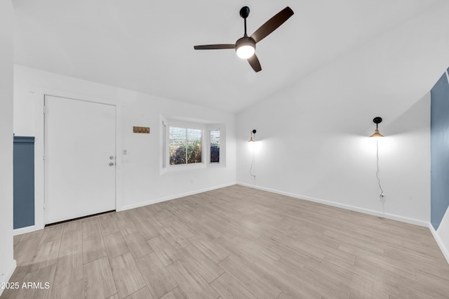 3201 W Mohawk Ln, Phoenix, AZ 85027 - unfurnished living room with ceiling fan, lofted ceiling, baseboards, and wood finished floors
