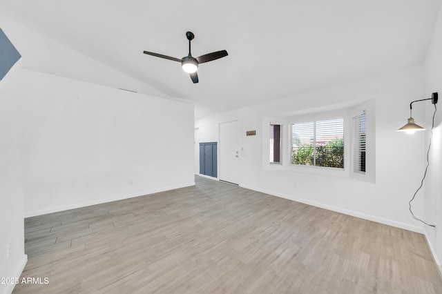 3201 W Mohawk Ln, Phoenix, AZ 85027 - empty room with ceiling fan, lofted ceiling, wood finished floors, and baseboards